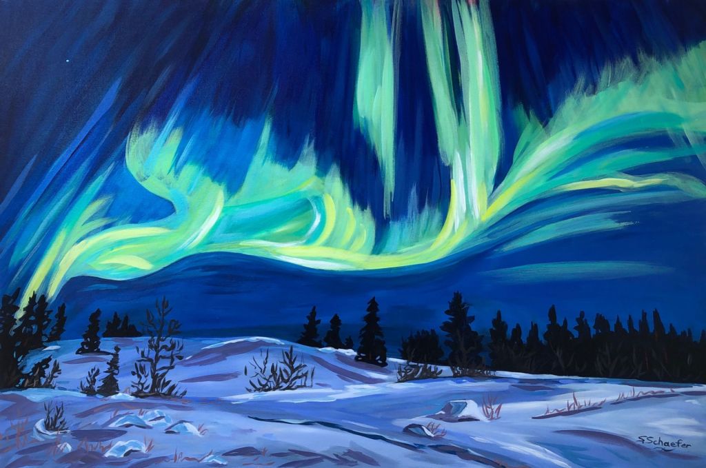 Vibrant greens and yellows of the northern lights against a dark treeline under a night sky.